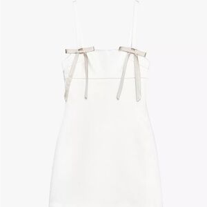 Elegant White Dress with Bow Accents